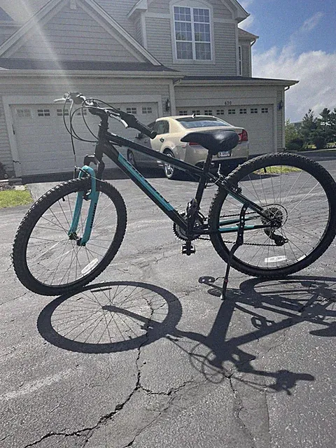 Blue And Black Nishiki Puelblo Mountain Bike